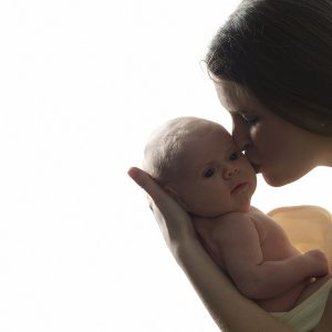 teething baby and mom